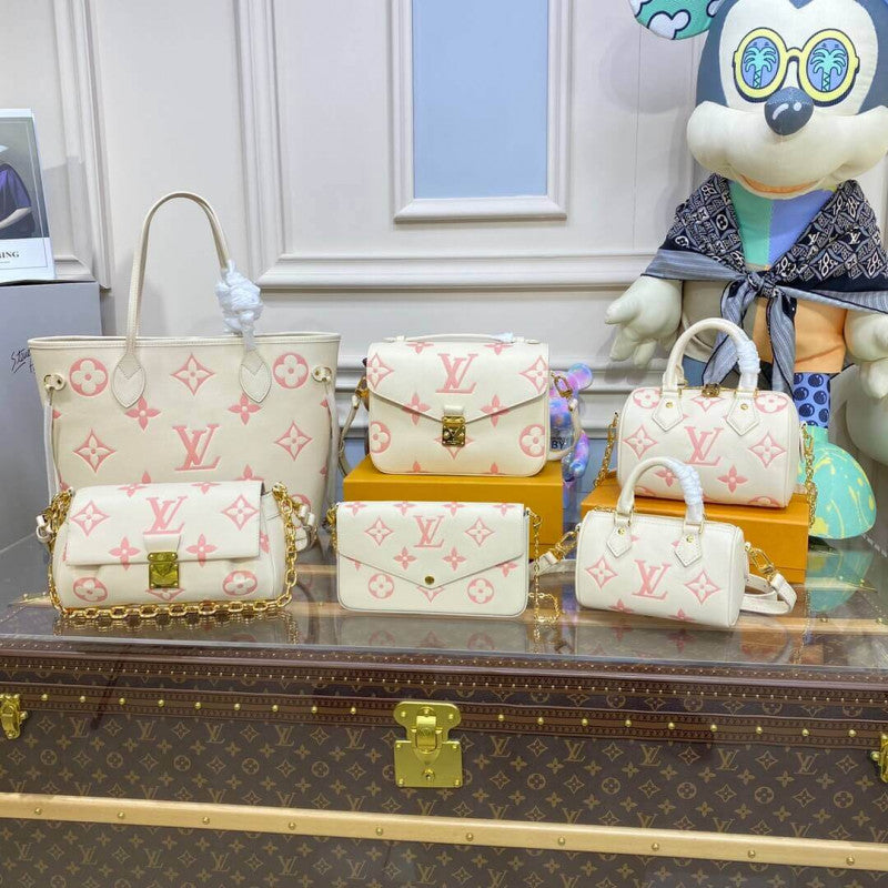 AlohaPlaza™ Monogram Empreinte Leather Neverfull MM M21579 Creme/Pink